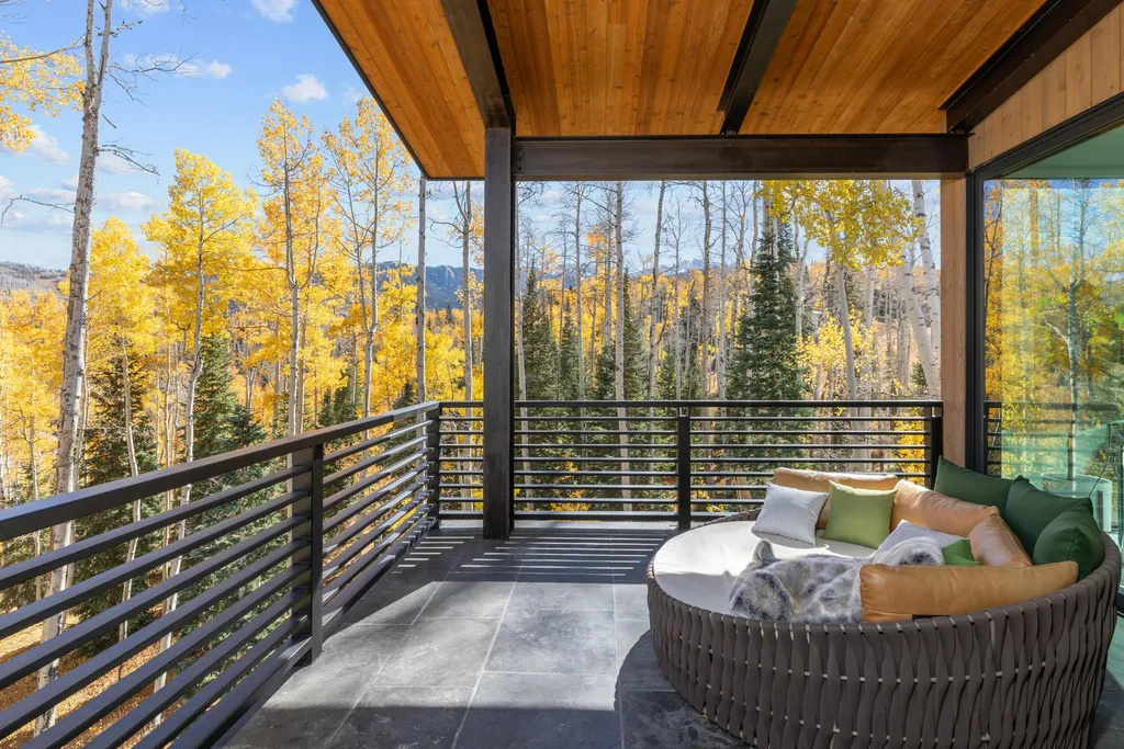 110 Highlands Way Home in Mountain Village, Colorado. Discover the epitome of mountain living in this 5-bedroom, 7.5-bathroom luxury home with direct ski-in/ski-out access via the Galloping Goose trail. Recently constructed, this mountain modern retreat offers breathtaking San Sophia mountain views, an open-concept design, and high-end finishes. 