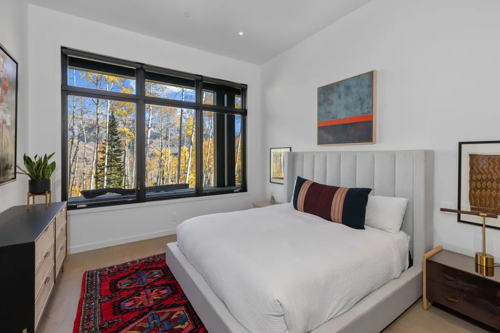 110 Highlands Way Home in Mountain Village, Colorado. Discover the epitome of mountain living in this 5-bedroom, 7.5-bathroom luxury home with direct ski-in/ski-out access via the Galloping Goose trail. Recently constructed, this mountain modern retreat offers breathtaking San Sophia mountain views, an open-concept design, and high-end finishes. 