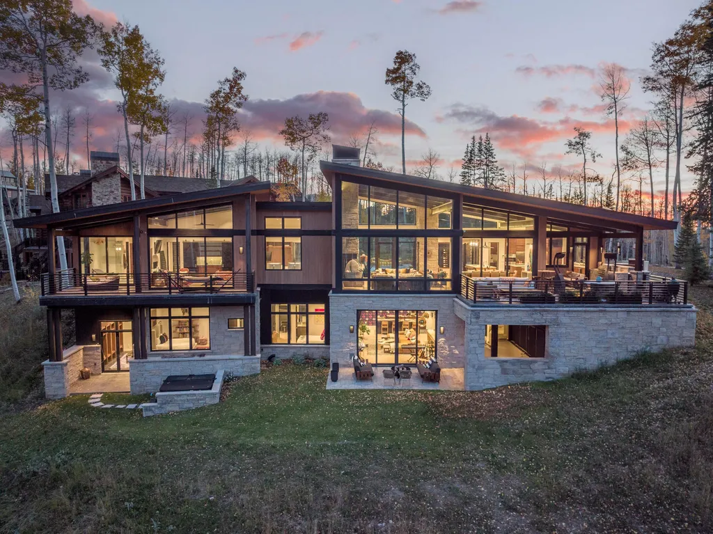 110 Highlands Way Home in Mountain Village, Colorado. Discover the epitome of mountain living in this 5-bedroom, 7.5-bathroom luxury home with direct ski-in/ski-out access via the Galloping Goose trail. Recently constructed, this mountain modern retreat offers breathtaking San Sophia mountain views, an open-concept design, and high-end finishes. 
