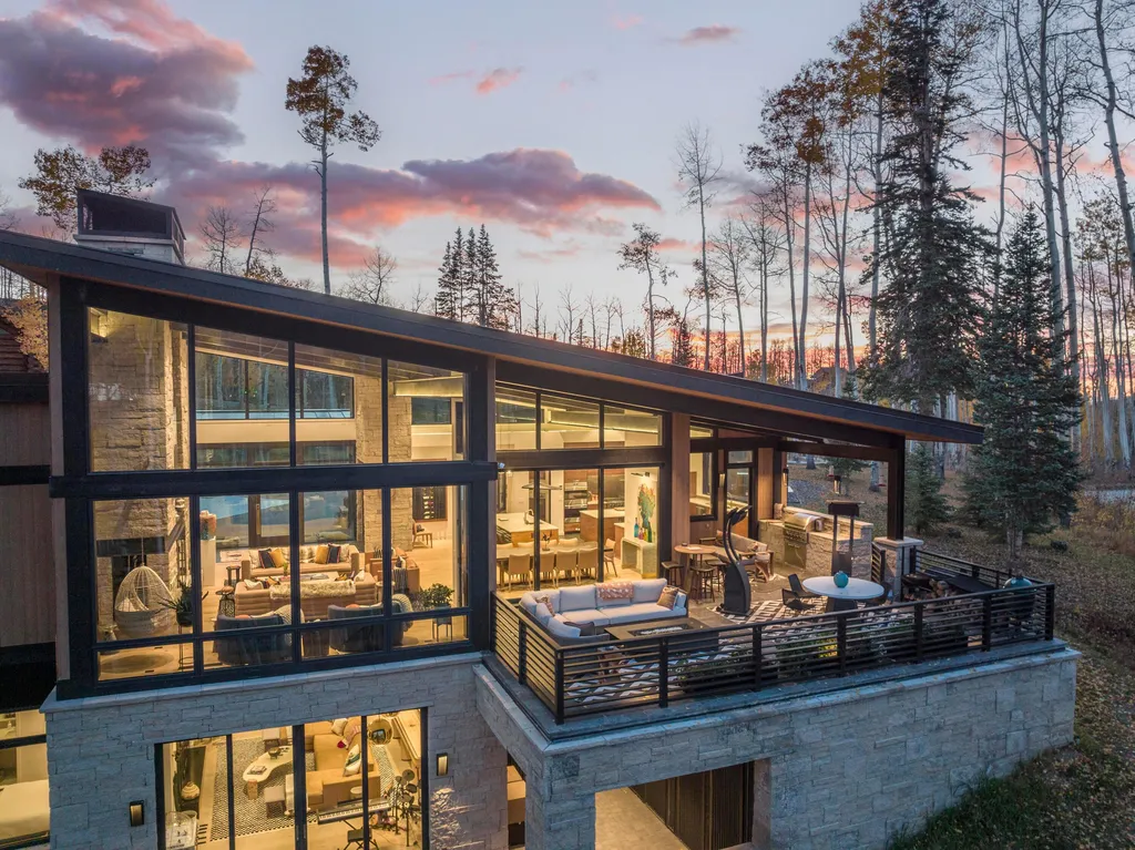 110 Highlands Way Home in Mountain Village, Colorado. Discover the epitome of mountain living in this 5-bedroom, 7.5-bathroom luxury home with direct ski-in/ski-out access via the Galloping Goose trail. Recently constructed, this mountain modern retreat offers breathtaking San Sophia mountain views, an open-concept design, and high-end finishes. 