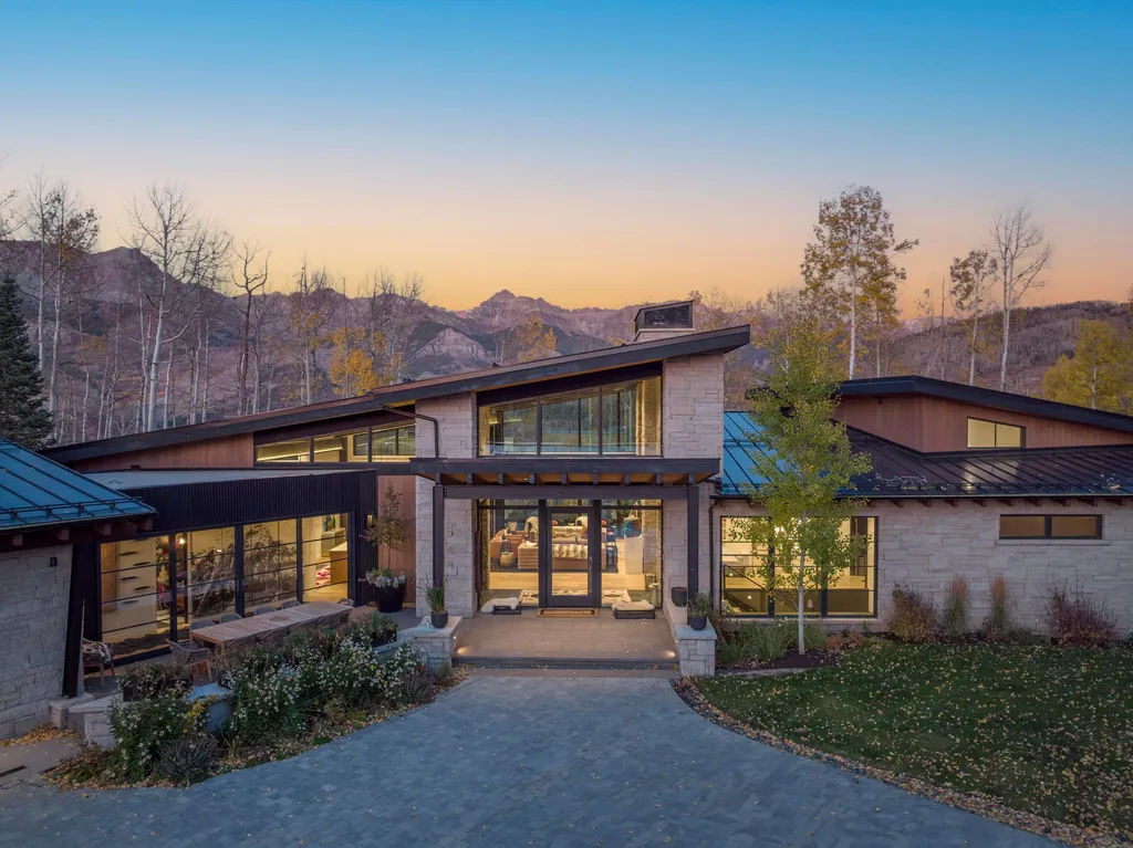 110 Highlands Way Home in Mountain Village, Colorado. Discover the epitome of mountain living in this 5-bedroom, 7.5-bathroom luxury home with direct ski-in/ski-out access via the Galloping Goose trail. Recently constructed, this mountain modern retreat offers breathtaking San Sophia mountain views, an open-concept design, and high-end finishes. 