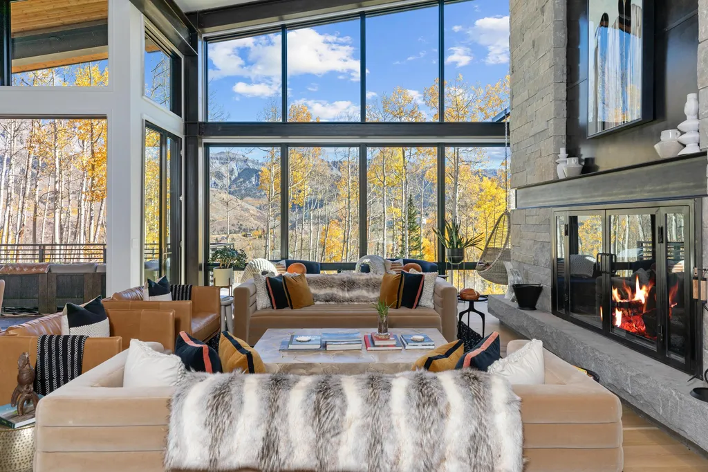110 Highlands Way Home in Mountain Village, Colorado. Discover the epitome of mountain living in this 5-bedroom, 7.5-bathroom luxury home with direct ski-in/ski-out access via the Galloping Goose trail. Recently constructed, this mountain modern retreat offers breathtaking San Sophia mountain views, an open-concept design, and high-end finishes. 