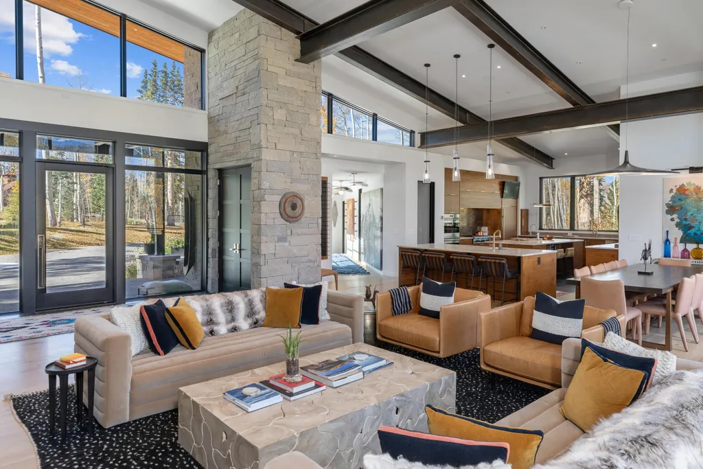 110 Highlands Way Home in Mountain Village, Colorado. Discover the epitome of mountain living in this 5-bedroom, 7.5-bathroom luxury home with direct ski-in/ski-out access via the Galloping Goose trail. Recently constructed, this mountain modern retreat offers breathtaking San Sophia mountain views, an open-concept design, and high-end finishes. 