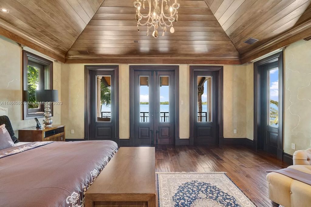 Experience the epitome of Mediterranean luxury at 230 Bal Bay Dr, an exclusive waterfront estate in Bal Harbour Village. Crafted by the esteemed Alexander Group, this custom-built masterpiece boasts exquisite details like custom millwork, Jerusalem stone flooring, and marble accents throughout.