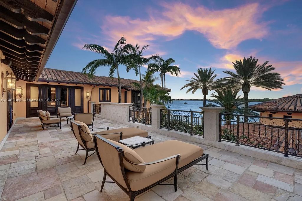 Experience the epitome of Mediterranean luxury at 230 Bal Bay Dr, an exclusive waterfront estate in Bal Harbour Village. Crafted by the esteemed Alexander Group, this custom-built masterpiece boasts exquisite details like custom millwork, Jerusalem stone flooring, and marble accents throughout.