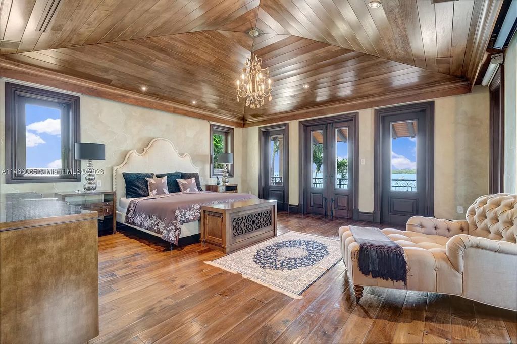 Experience the epitome of Mediterranean luxury at 230 Bal Bay Dr, an exclusive waterfront estate in Bal Harbour Village. Crafted by the esteemed Alexander Group, this custom-built masterpiece boasts exquisite details like custom millwork, Jerusalem stone flooring, and marble accents throughout.