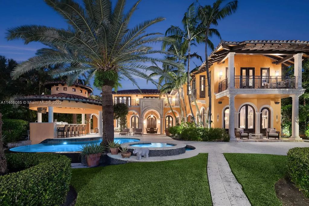 Experience the epitome of Mediterranean luxury at 230 Bal Bay Dr, an exclusive waterfront estate in Bal Harbour Village. Crafted by the esteemed Alexander Group, this custom-built masterpiece boasts exquisite details like custom millwork, Jerusalem stone flooring, and marble accents throughout.