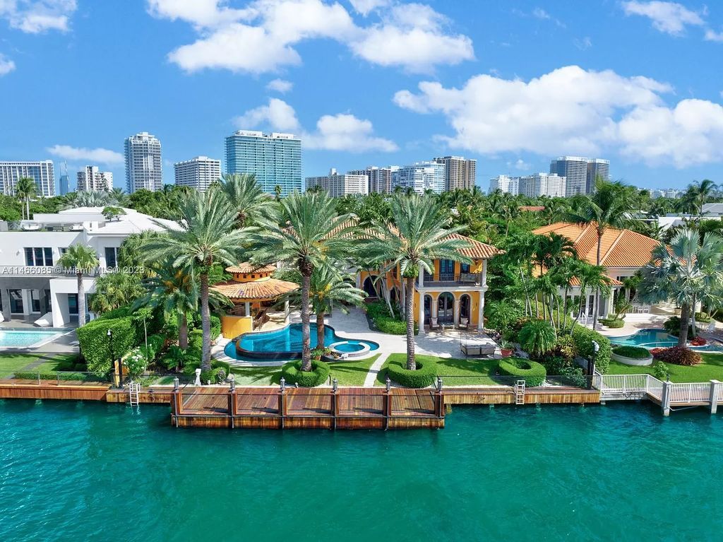 Experience the epitome of Mediterranean luxury at 230 Bal Bay Dr, an exclusive waterfront estate in Bal Harbour Village. Crafted by the esteemed Alexander Group, this custom-built masterpiece boasts exquisite details like custom millwork, Jerusalem stone flooring, and marble accents throughout.