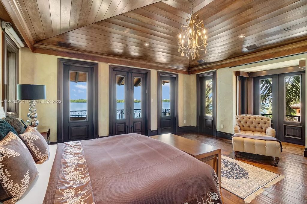 Experience the epitome of Mediterranean luxury at 230 Bal Bay Dr, an exclusive waterfront estate in Bal Harbour Village. Crafted by the esteemed Alexander Group, this custom-built masterpiece boasts exquisite details like custom millwork, Jerusalem stone flooring, and marble accents throughout.