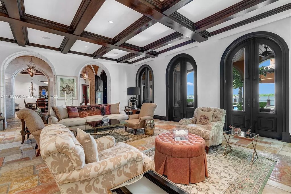 Experience the epitome of Mediterranean luxury at 230 Bal Bay Dr, an exclusive waterfront estate in Bal Harbour Village. Crafted by the esteemed Alexander Group, this custom-built masterpiece boasts exquisite details like custom millwork, Jerusalem stone flooring, and marble accents throughout.