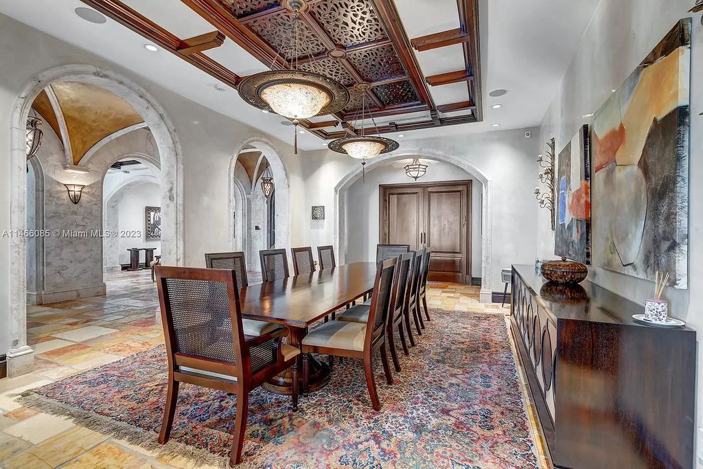 Experience the epitome of Mediterranean luxury at 230 Bal Bay Dr, an exclusive waterfront estate in Bal Harbour Village. Crafted by the esteemed Alexander Group, this custom-built masterpiece boasts exquisite details like custom millwork, Jerusalem stone flooring, and marble accents throughout.