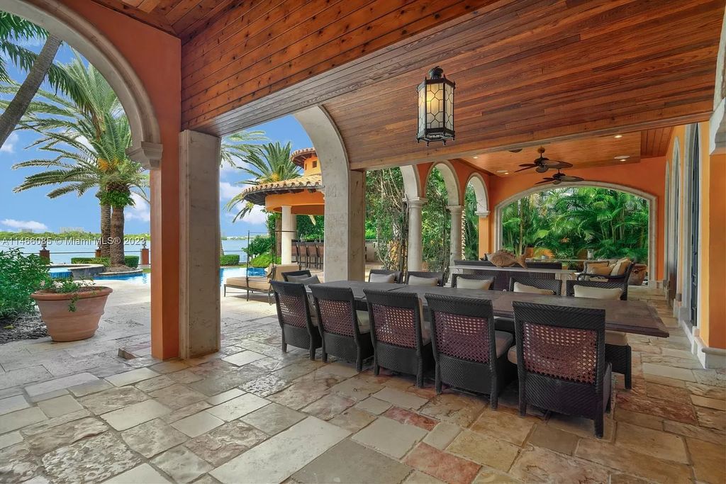Experience the epitome of Mediterranean luxury at 230 Bal Bay Dr, an exclusive waterfront estate in Bal Harbour Village. Crafted by the esteemed Alexander Group, this custom-built masterpiece boasts exquisite details like custom millwork, Jerusalem stone flooring, and marble accents throughout.