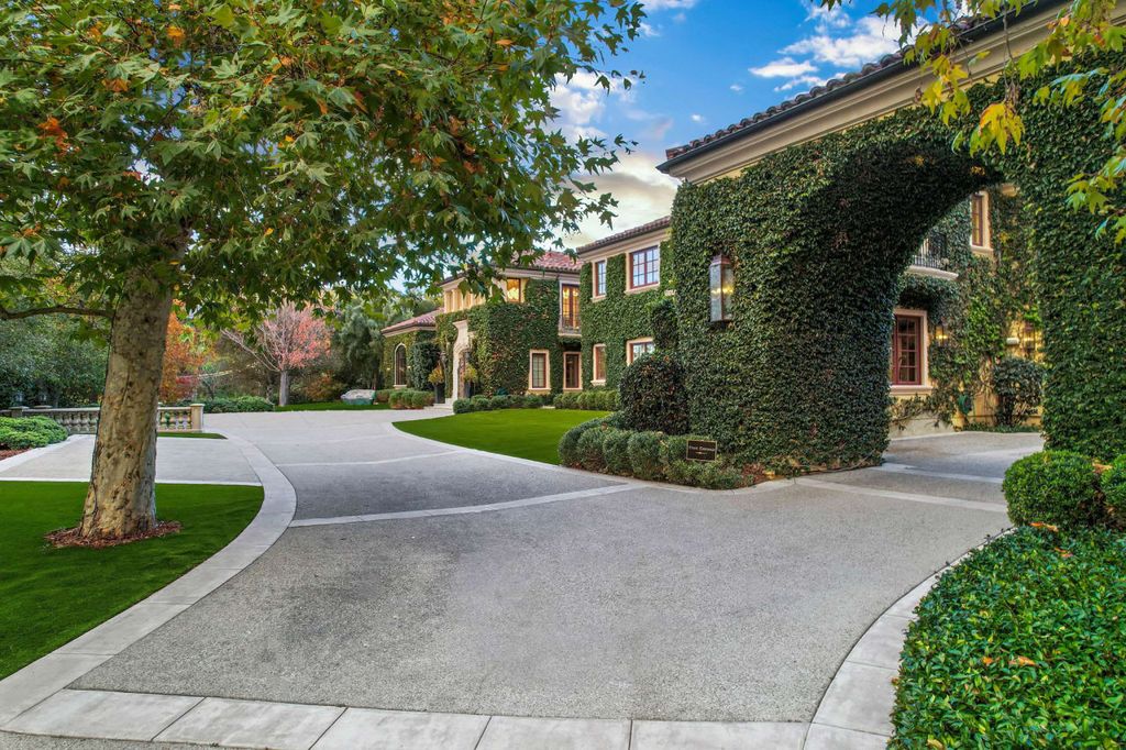 2505 Summitridge Drive Home in Beverly Hills, California, Discover the epitome of luxury living in this custom 9-bedroom, 11-bathroom estate nestled within the exclusive Bella Vista community in Beverly Hills. Boasting sophisticated amenities such as a private park, basketball court, and unobstructed canyon views, this residence seamlessly blends old-world Italian charm with modern technology.