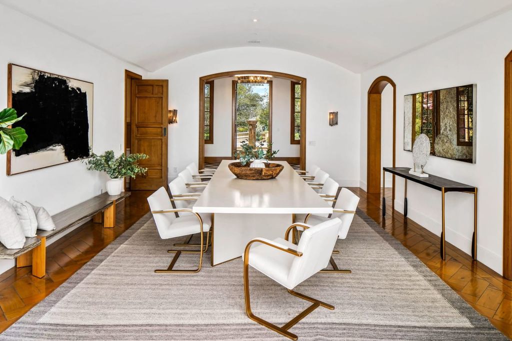 2505 Summitridge Drive Home in Beverly Hills, California, Discover the epitome of luxury living in this custom 9-bedroom, 11-bathroom estate nestled within the exclusive Bella Vista community in Beverly Hills. Boasting sophisticated amenities such as a private park, basketball court, and unobstructed canyon views, this residence seamlessly blends old-world Italian charm with modern technology.