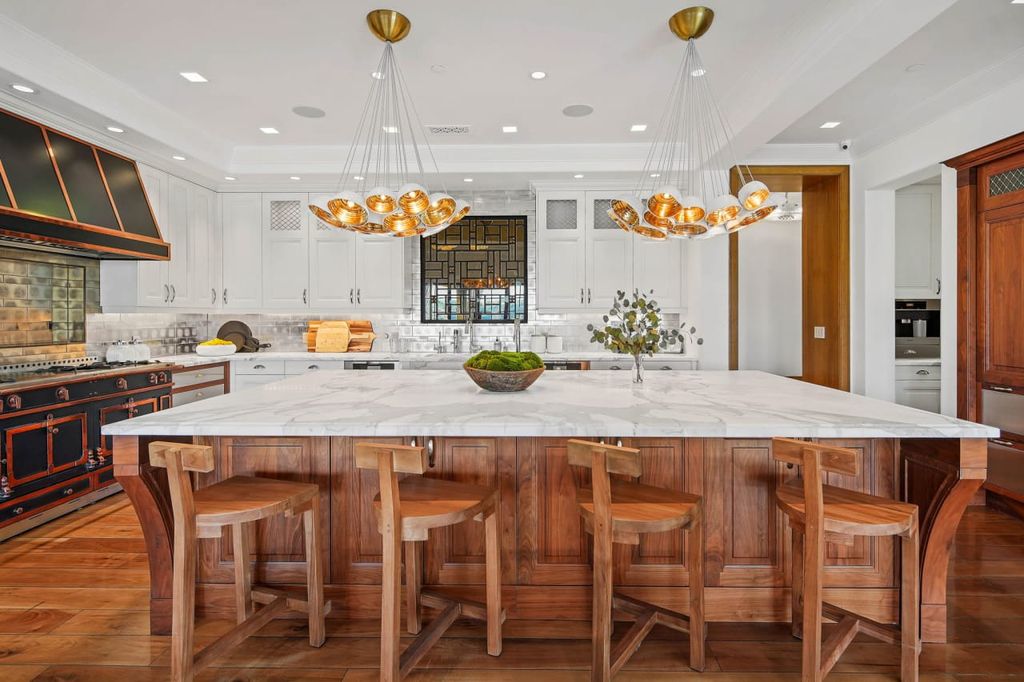 2505 Summitridge Drive Home in Beverly Hills, California, Discover the epitome of luxury living in this custom 9-bedroom, 11-bathroom estate nestled within the exclusive Bella Vista community in Beverly Hills. Boasting sophisticated amenities such as a private park, basketball court, and unobstructed canyon views, this residence seamlessly blends old-world Italian charm with modern technology.