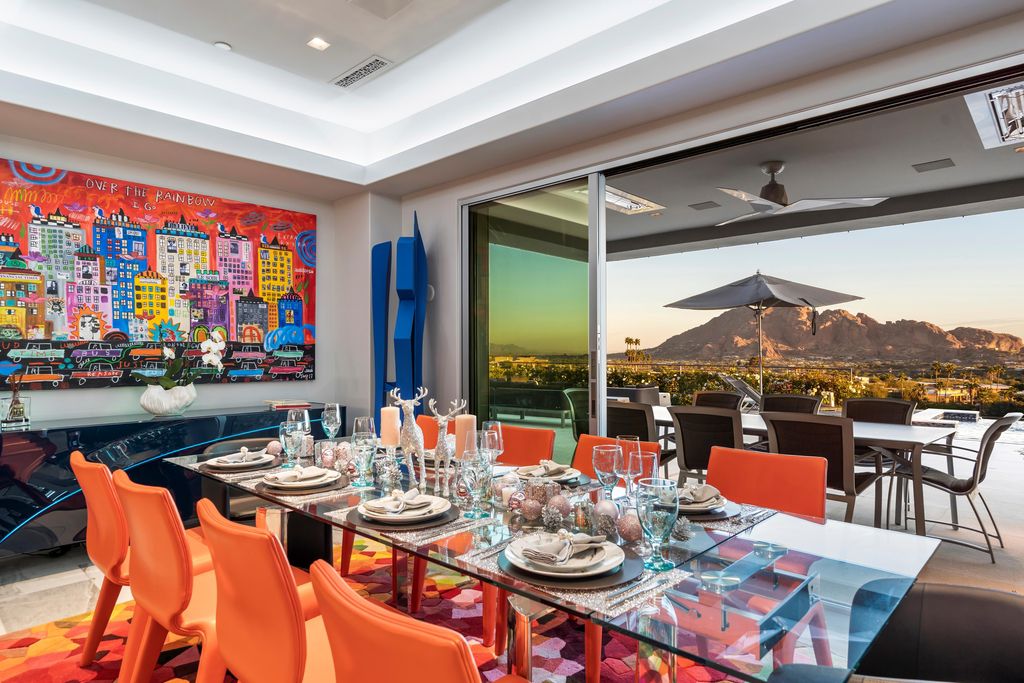 6850 North 39th Place Home in Paradise Valley, Arizona. Indulge in the epitome of luxury living with this exquisite hillside estate offering breathtaking city lights and Camelback Mountain views. Situated on just under 2.2 acres inside the guard-gated Paradise Reserve community, this newly crafted custom home seamlessly integrates indoor and outdoor spaces. 