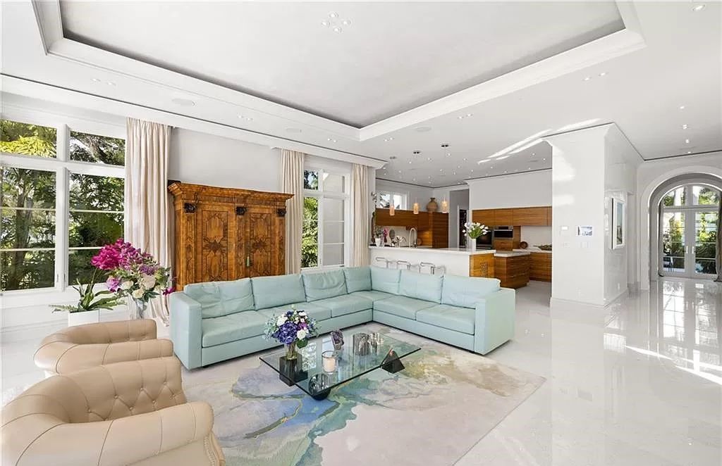 Indulge in the pinnacle of luxury at this Palladian-inspired Grand Estate in Fort Myers. Sprawling across 2 waterfront acres, this 19,184 square feet masterpiece boasts 4 bedrooms, 2 dens, a private cinema, and a 2,000-bottle wine cellar in the main residence, with an additional 3 bedrooms in the guest house.