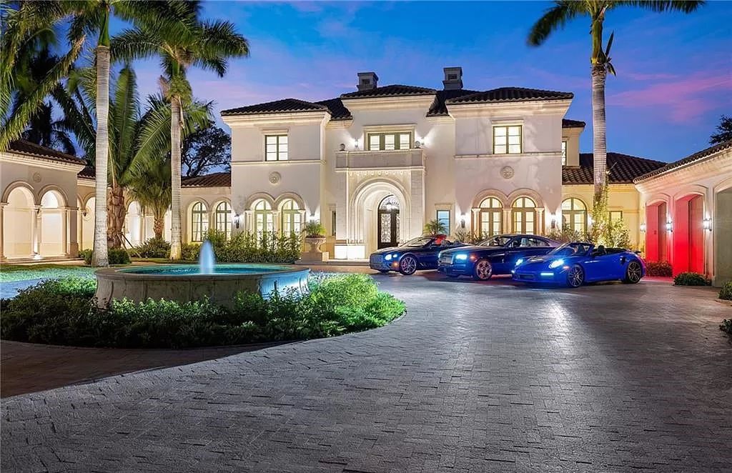 Indulge in the pinnacle of luxury at this Palladian-inspired Grand Estate in Fort Myers. Sprawling across 2 waterfront acres, this 19,184 square feet masterpiece boasts 4 bedrooms, 2 dens, a private cinema, and a 2,000-bottle wine cellar in the main residence, with an additional 3 bedrooms in the guest house.