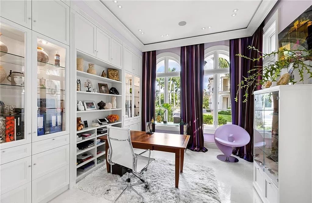 Indulge in the pinnacle of luxury at this Palladian-inspired Grand Estate in Fort Myers. Sprawling across 2 waterfront acres, this 19,184 square feet masterpiece boasts 4 bedrooms, 2 dens, a private cinema, and a 2,000-bottle wine cellar in the main residence, with an additional 3 bedrooms in the guest house.