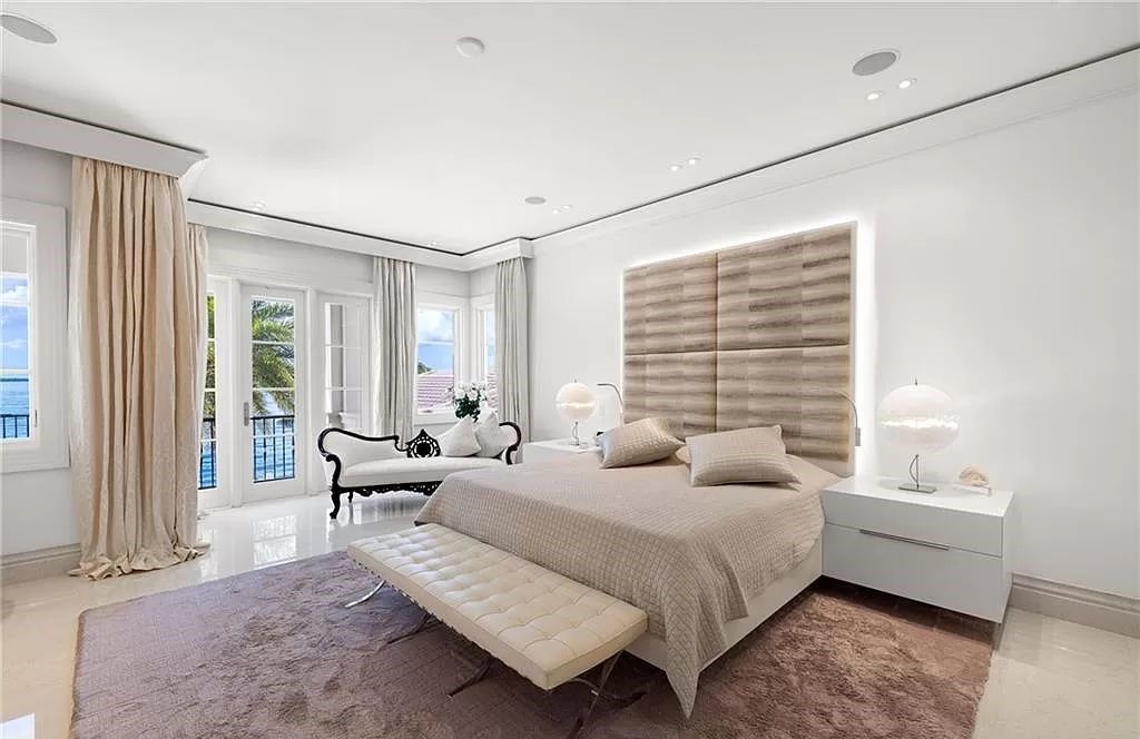 Indulge in the pinnacle of luxury at this Palladian-inspired Grand Estate in Fort Myers. Sprawling across 2 waterfront acres, this 19,184 square feet masterpiece boasts 4 bedrooms, 2 dens, a private cinema, and a 2,000-bottle wine cellar in the main residence, with an additional 3 bedrooms in the guest house.