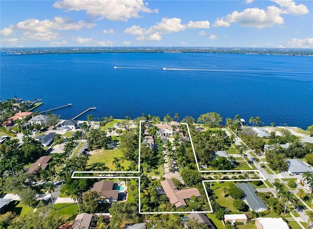 Indulge in the pinnacle of luxury at this Palladian-inspired Grand Estate in Fort Myers. Sprawling across 2 waterfront acres, this 19,184 square feet masterpiece boasts 4 bedrooms, 2 dens, a private cinema, and a 2,000-bottle wine cellar in the main residence, with an additional 3 bedrooms in the guest house.