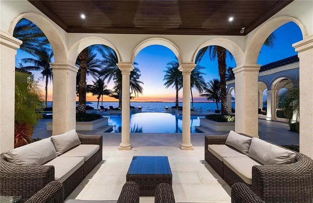 Indulge in the pinnacle of luxury at this Palladian-inspired Grand Estate in Fort Myers. Sprawling across 2 waterfront acres, this 19,184 square feet masterpiece boasts 4 bedrooms, 2 dens, a private cinema, and a 2,000-bottle wine cellar in the main residence, with an additional 3 bedrooms in the guest house.