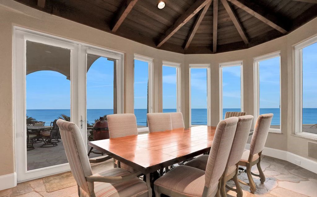 Step into the epitome of coastal luxury at 1263 Ponte Vedra Blvd, an awe-inspiring custom estate in Ponte Vedra Beach. Perched on a high bluff with 200' of ocean-frontage, this 12,751-square-foot sanctuary boasts 6 ensuite bedrooms, 7 full and 3 half baths, a media room, elevator, and a wine cellar for 2200 bottles.