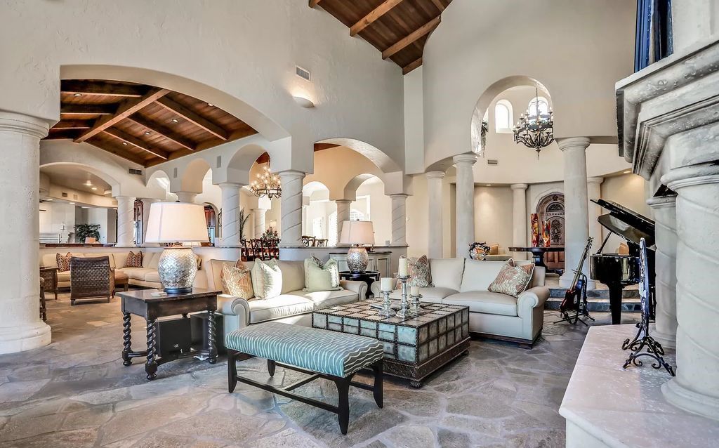 Step into the epitome of coastal luxury at 1263 Ponte Vedra Blvd, an awe-inspiring custom estate in Ponte Vedra Beach. Perched on a high bluff with 200' of ocean-frontage, this 12,751-square-foot sanctuary boasts 6 ensuite bedrooms, 7 full and 3 half baths, a media room, elevator, and a wine cellar for 2200 bottles.