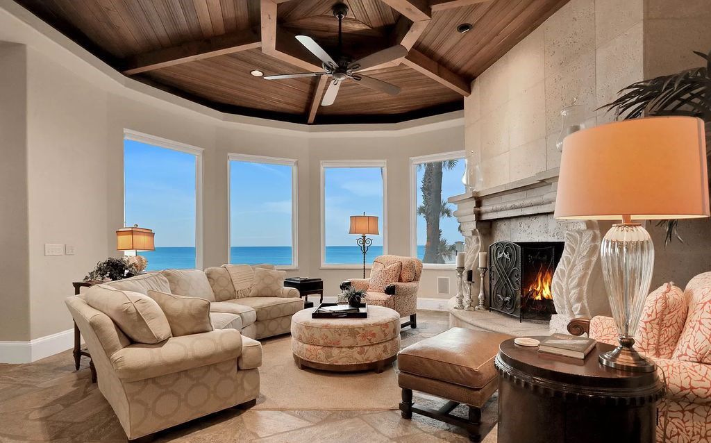 Step into the epitome of coastal luxury at 1263 Ponte Vedra Blvd, an awe-inspiring custom estate in Ponte Vedra Beach. Perched on a high bluff with 200' of ocean-frontage, this 12,751-square-foot sanctuary boasts 6 ensuite bedrooms, 7 full and 3 half baths, a media room, elevator, and a wine cellar for 2200 bottles.