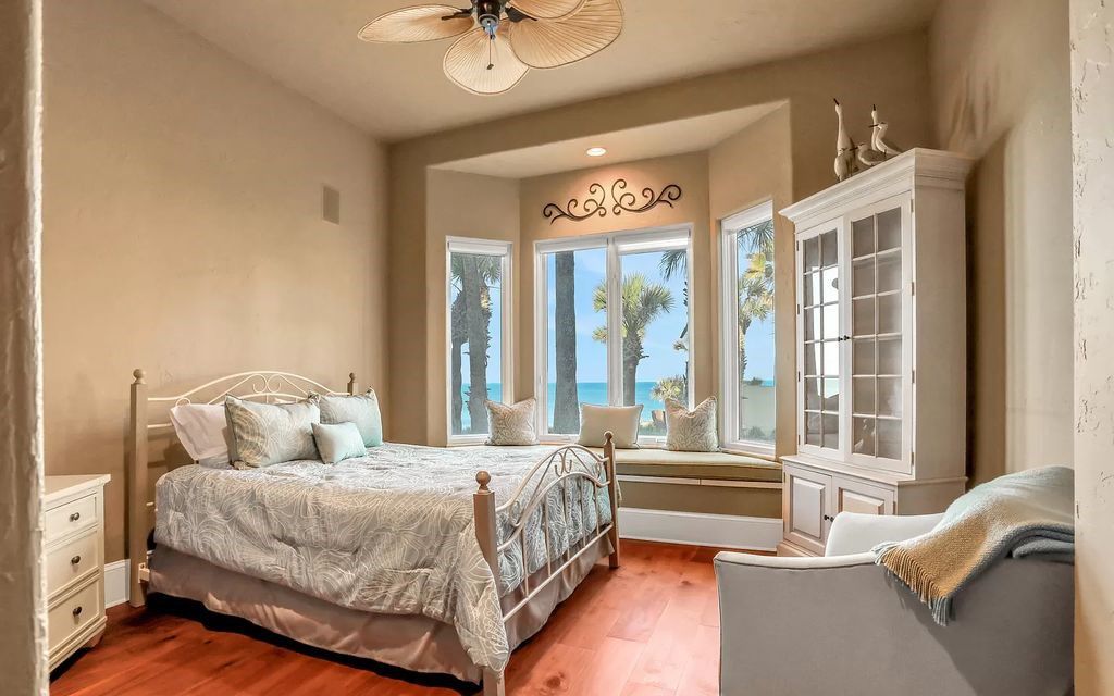 Step into the epitome of coastal luxury at 1263 Ponte Vedra Blvd, an awe-inspiring custom estate in Ponte Vedra Beach. Perched on a high bluff with 200' of ocean-frontage, this 12,751-square-foot sanctuary boasts 6 ensuite bedrooms, 7 full and 3 half baths, a media room, elevator, and a wine cellar for 2200 bottles.