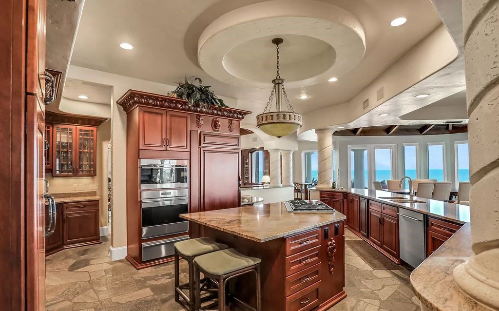 Step into the epitome of coastal luxury at 1263 Ponte Vedra Blvd, an awe-inspiring custom estate in Ponte Vedra Beach. Perched on a high bluff with 200' of ocean-frontage, this 12,751-square-foot sanctuary boasts 6 ensuite bedrooms, 7 full and 3 half baths, a media room, elevator, and a wine cellar for 2200 bottles.