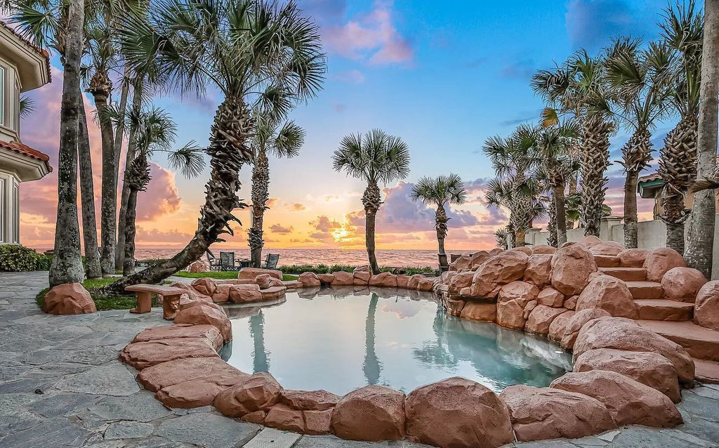 Step into the epitome of coastal luxury at 1263 Ponte Vedra Blvd, an awe-inspiring custom estate in Ponte Vedra Beach. Perched on a high bluff with 200' of ocean-frontage, this 12,751-square-foot sanctuary boasts 6 ensuite bedrooms, 7 full and 3 half baths, a media room, elevator, and a wine cellar for 2200 bottles.