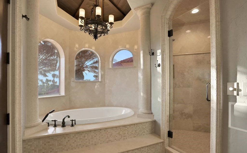 Step into the epitome of coastal luxury at 1263 Ponte Vedra Blvd, an awe-inspiring custom estate in Ponte Vedra Beach. Perched on a high bluff with 200' of ocean-frontage, this 12,751-square-foot sanctuary boasts 6 ensuite bedrooms, 7 full and 3 half baths, a media room, elevator, and a wine cellar for 2200 bottles.
