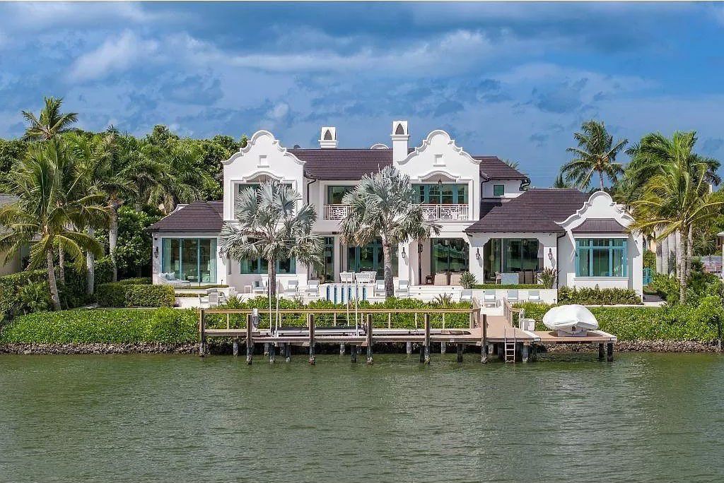 Indulge in the pinnacle of waterfront luxury at 3401 Rum Row, Naples, Florida. This exquisite property, with approximately 130 feet of shoreline, offers unparalleled vistas of Galleon Cove. Crafted by London Bay Construction, Inc. and designed by Stofft Cooney Architects, LLC, it harmonizes opulent interiors by Anthony Catalfano Interiors with lavish outdoor entertainment spaces.