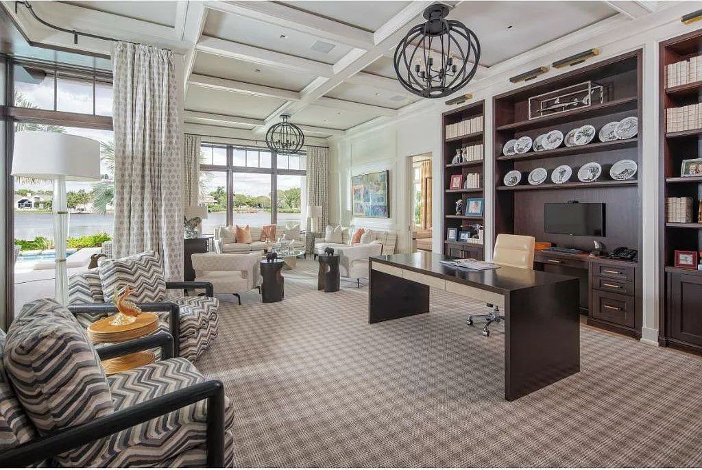 Indulge in the pinnacle of waterfront luxury at 3401 Rum Row, Naples, Florida. This exquisite property, with approximately 130 feet of shoreline, offers unparalleled vistas of Galleon Cove. Crafted by London Bay Construction, Inc. and designed by Stofft Cooney Architects, LLC, it harmonizes opulent interiors by Anthony Catalfano Interiors with lavish outdoor entertainment spaces.