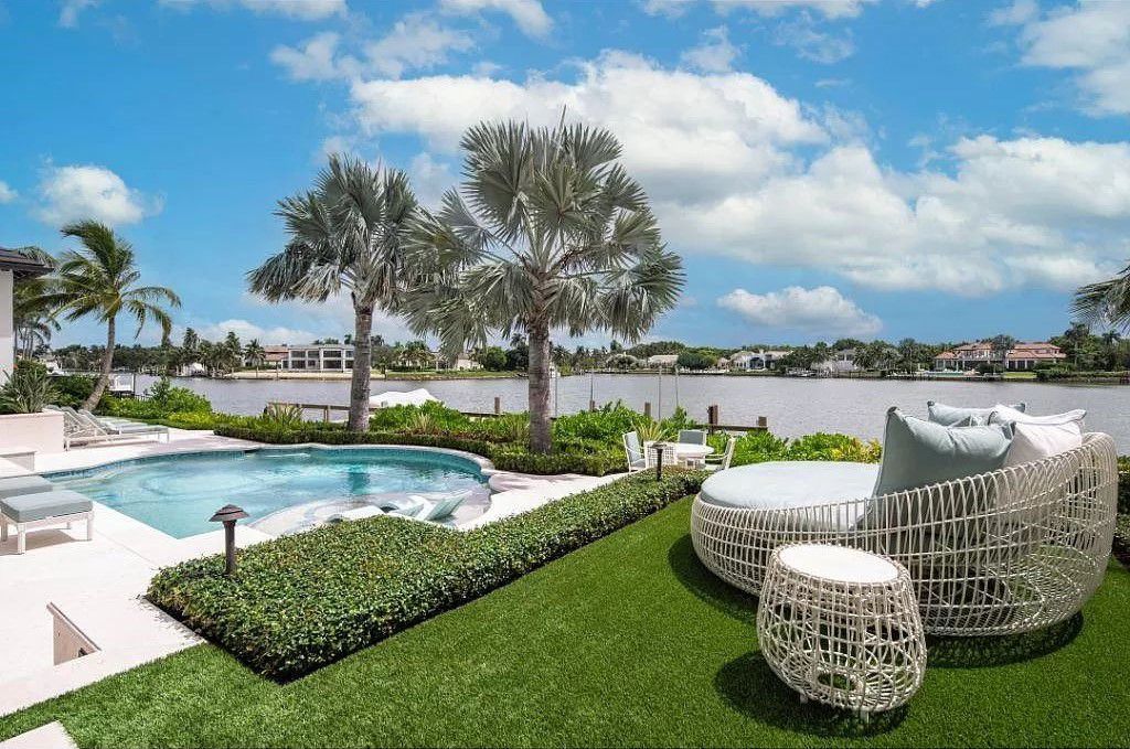 Indulge in the pinnacle of waterfront luxury at 3401 Rum Row, Naples, Florida. This exquisite property, with approximately 130 feet of shoreline, offers unparalleled vistas of Galleon Cove. Crafted by London Bay Construction, Inc. and designed by Stofft Cooney Architects, LLC, it harmonizes opulent interiors by Anthony Catalfano Interiors with lavish outdoor entertainment spaces.