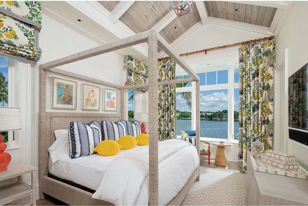 Indulge in the pinnacle of waterfront luxury at 3401 Rum Row, Naples, Florida. This exquisite property, with approximately 130 feet of shoreline, offers unparalleled vistas of Galleon Cove. Crafted by London Bay Construction, Inc. and designed by Stofft Cooney Architects, LLC, it harmonizes opulent interiors by Anthony Catalfano Interiors with lavish outdoor entertainment spaces.