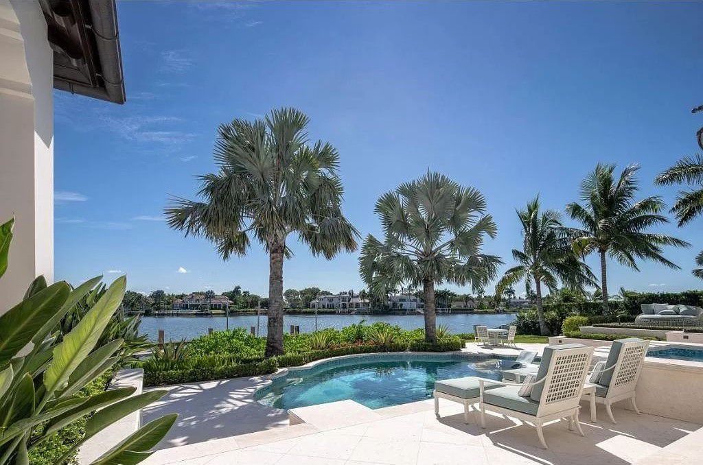 Indulge in the pinnacle of waterfront luxury at 3401 Rum Row, Naples, Florida. This exquisite property, with approximately 130 feet of shoreline, offers unparalleled vistas of Galleon Cove. Crafted by London Bay Construction, Inc. and designed by Stofft Cooney Architects, LLC, it harmonizes opulent interiors by Anthony Catalfano Interiors with lavish outdoor entertainment spaces.