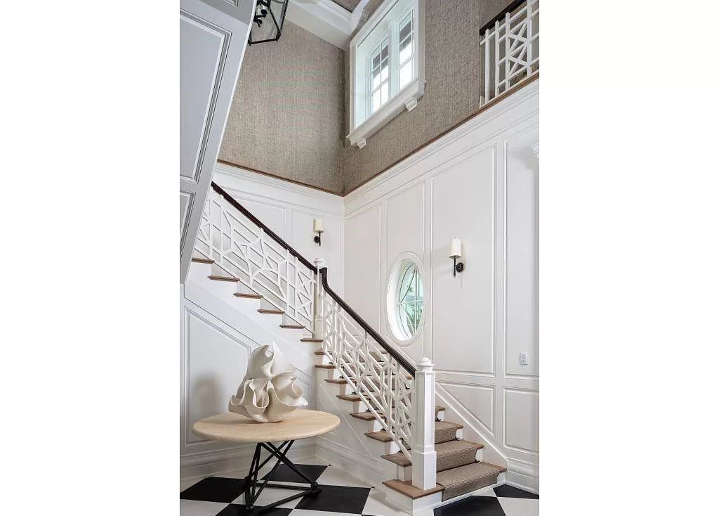 Indulge in the pinnacle of waterfront luxury at 3401 Rum Row, Naples, Florida. This exquisite property, with approximately 130 feet of shoreline, offers unparalleled vistas of Galleon Cove. Crafted by London Bay Construction, Inc. and designed by Stofft Cooney Architects, LLC, it harmonizes opulent interiors by Anthony Catalfano Interiors with lavish outdoor entertainment spaces.