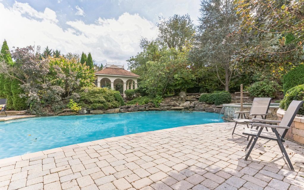Luxury Retreat in Great Falls Immerse Yourself in Tranquility with a Stunning Custom Home on 2 Acres Priced at 4950999 54