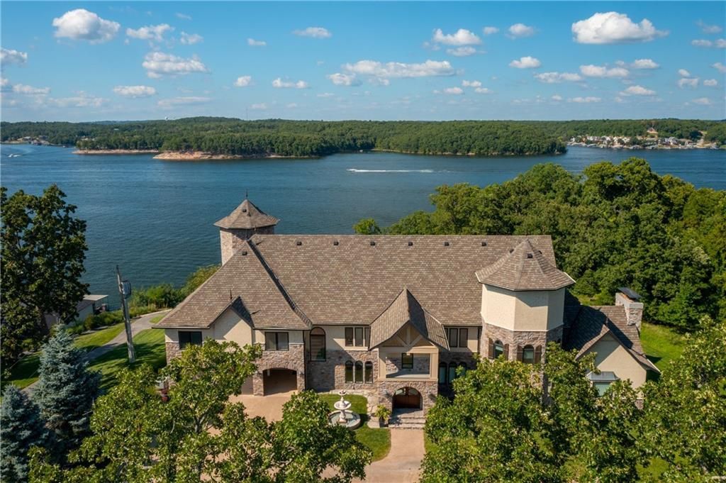 Stone Mansion Iconic Lakefront Retreat on the Beautiful Lake of the Ozarks Missouri Offered at 7.8 Million 1