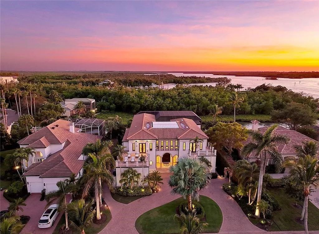 Embrace the pinnacle of coastal luxury at 1450 Gulfstar Dr S, Naples, Florida. Nestled within the exclusive Southpointe Island enclave, this architectural marvel boasts direct Gulf access and recent updates that elevate it to unparalleled sophistication.