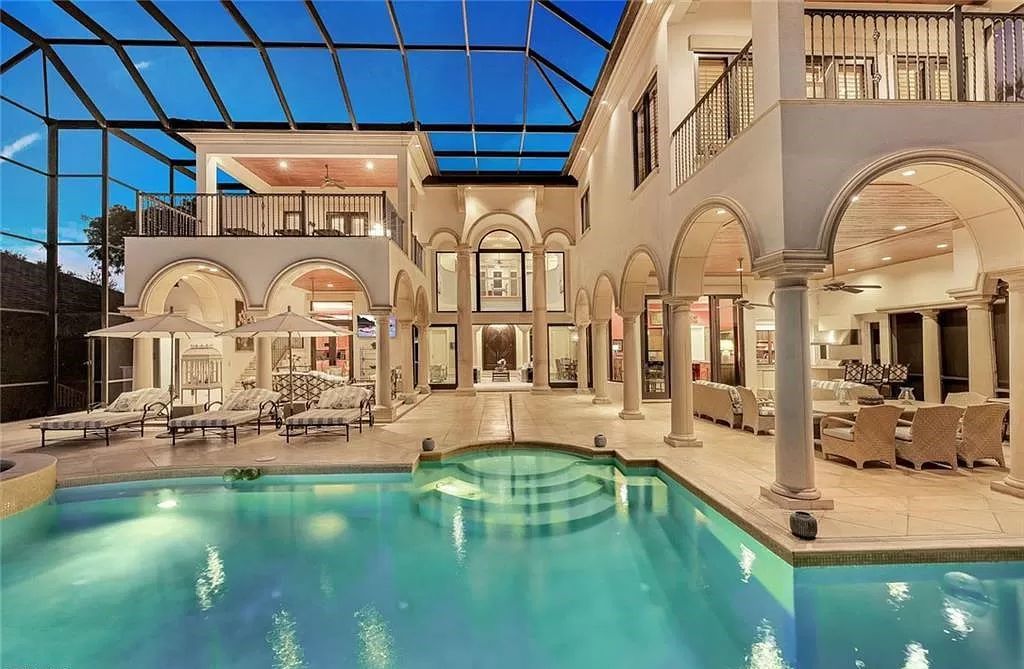 Embrace the pinnacle of coastal luxury at 1450 Gulfstar Dr S, Naples, Florida. Nestled within the exclusive Southpointe Island enclave, this architectural marvel boasts direct Gulf access and recent updates that elevate it to unparalleled sophistication.