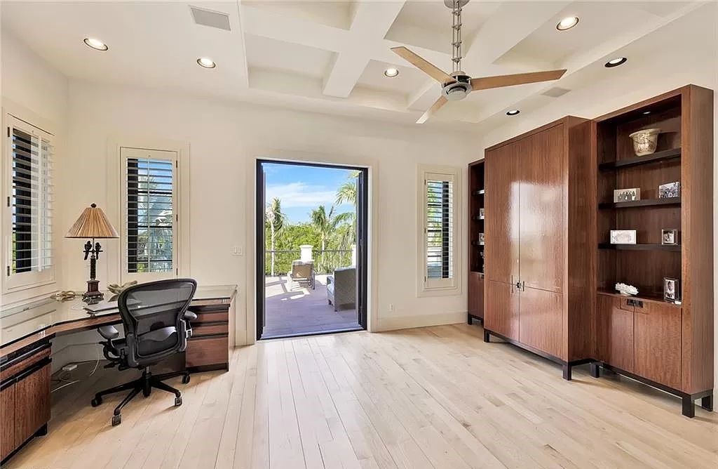 Embrace the pinnacle of coastal luxury at 1450 Gulfstar Dr S, Naples, Florida. Nestled within the exclusive Southpointe Island enclave, this architectural marvel boasts direct Gulf access and recent updates that elevate it to unparalleled sophistication.