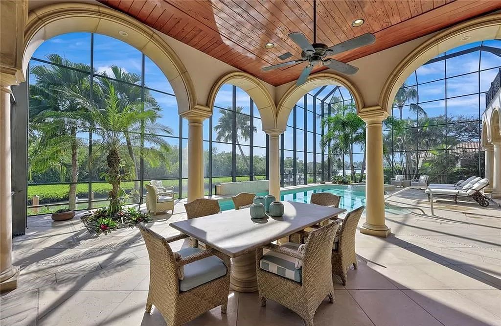 Embrace the pinnacle of coastal luxury at 1450 Gulfstar Dr S, Naples, Florida. Nestled within the exclusive Southpointe Island enclave, this architectural marvel boasts direct Gulf access and recent updates that elevate it to unparalleled sophistication.