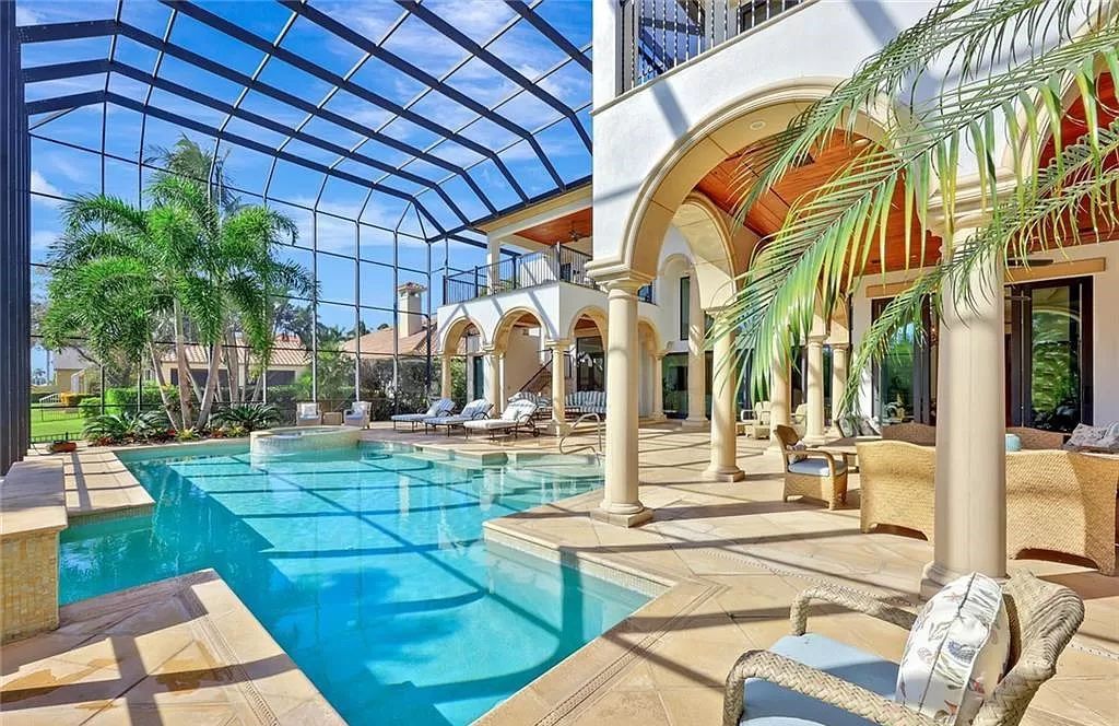 Embrace the pinnacle of coastal luxury at 1450 Gulfstar Dr S, Naples, Florida. Nestled within the exclusive Southpointe Island enclave, this architectural marvel boasts direct Gulf access and recent updates that elevate it to unparalleled sophistication.