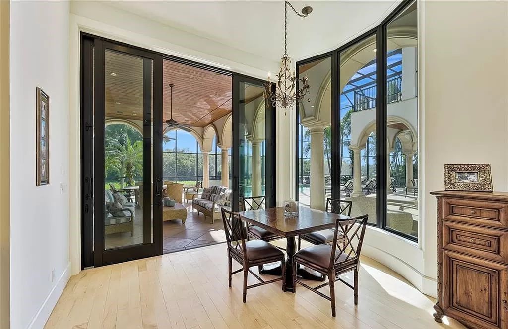 Embrace the pinnacle of coastal luxury at 1450 Gulfstar Dr S, Naples, Florida. Nestled within the exclusive Southpointe Island enclave, this architectural marvel boasts direct Gulf access and recent updates that elevate it to unparalleled sophistication.