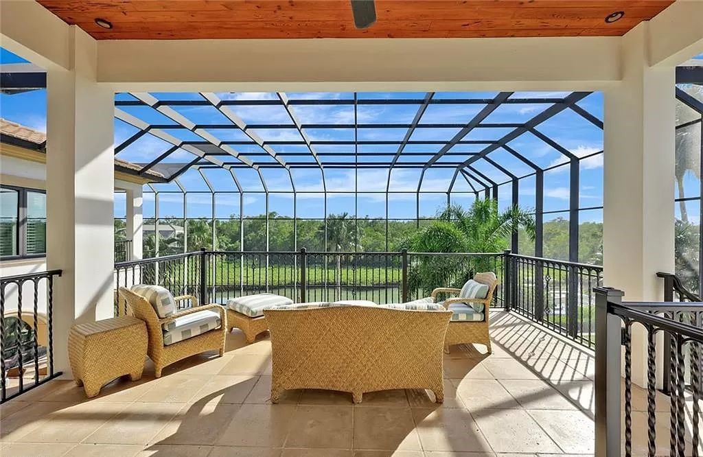 Embrace the pinnacle of coastal luxury at 1450 Gulfstar Dr S, Naples, Florida. Nestled within the exclusive Southpointe Island enclave, this architectural marvel boasts direct Gulf access and recent updates that elevate it to unparalleled sophistication.