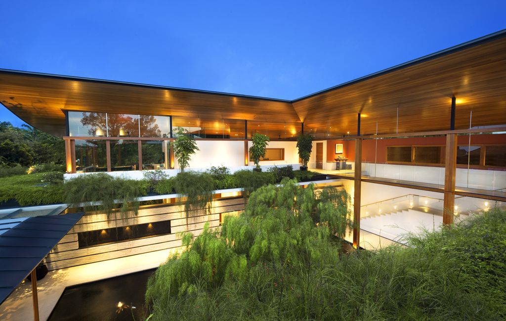Willow House, Tropical Oasis Integrates Nature and Play by Guz Architects