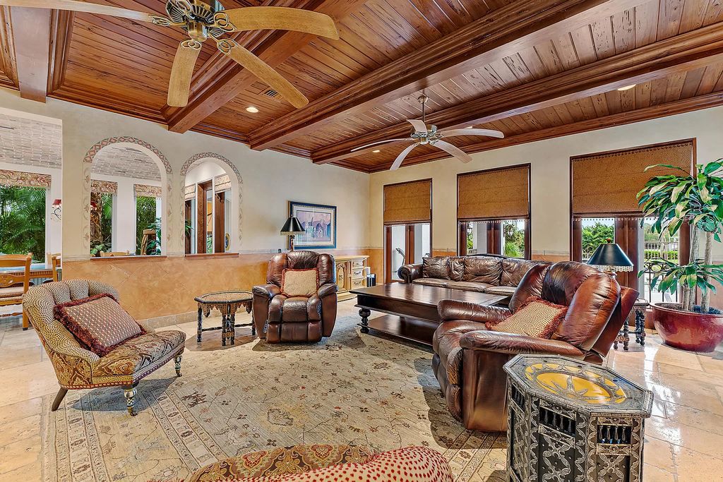 Discover the epitome of refined living at 2929 Marys Way, a Moroccan-inspired waterfront sanctuary in Palm Beach Gardens, Florida. This 5-bed, 9-bath home, remodeled in 2018, boasts 7,175 square feet of meticulously crafted living space on a sprawling 0.68-acre lot.